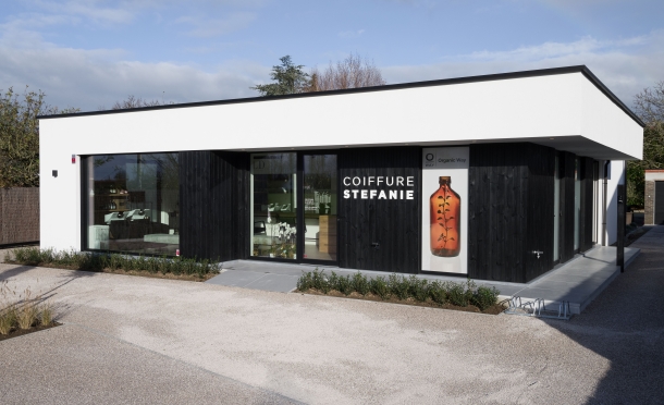 Kapperszaak met woonruimte